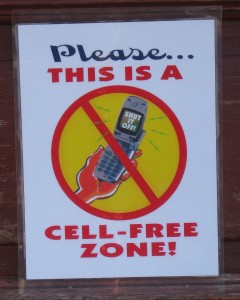 At a health food store in Mendocino CA customers are asked to not use cell phones 